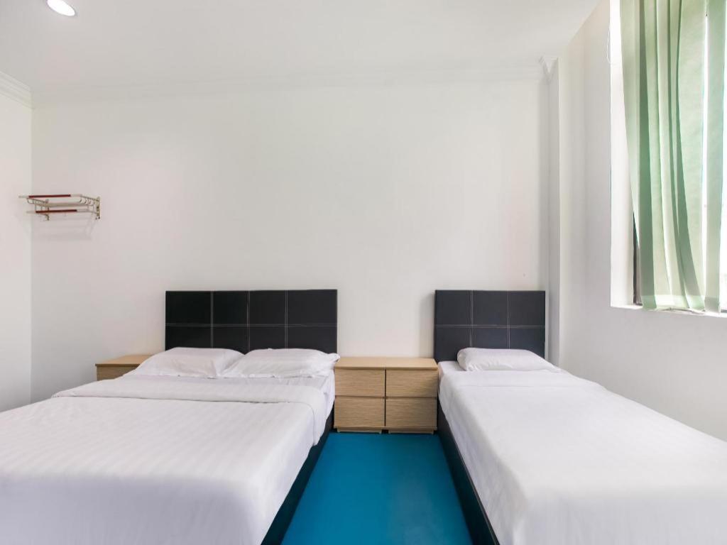 Spot On 89726 Capsule Inn Kota Kinabalu Buitenkant foto